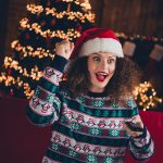 Woman watching tv at Christmas